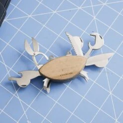 KIKKERLAND Multi Tool In A Crab Design - Mini Scissor - Bottle Opener - Rope -Handy Home CD114 Crab Multitool ACTION 0761 square
