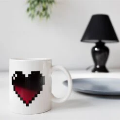 KIKKERLAND Morph Coffee Mug Heart -Handy Home CU44 Morph Coffee Mug Heart KL 2016 1303 Action 2